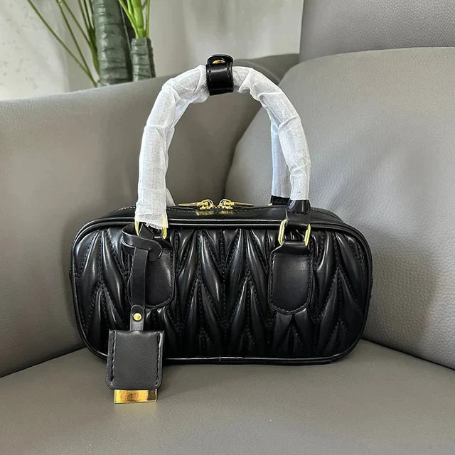 Women-Upgraded-Leather-Pleated-Boston-Handbag-Brand-Design-Metal-Letters-Large-Capacity-Ladies-Shoulder-Bag-Exquisite.jpg_640x640_d9b32ab6-dbeb-41f7-9112-6c298f81cf90.webp